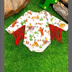 Baby’s tassel onesie